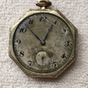 Vintage watch in grandfather clock